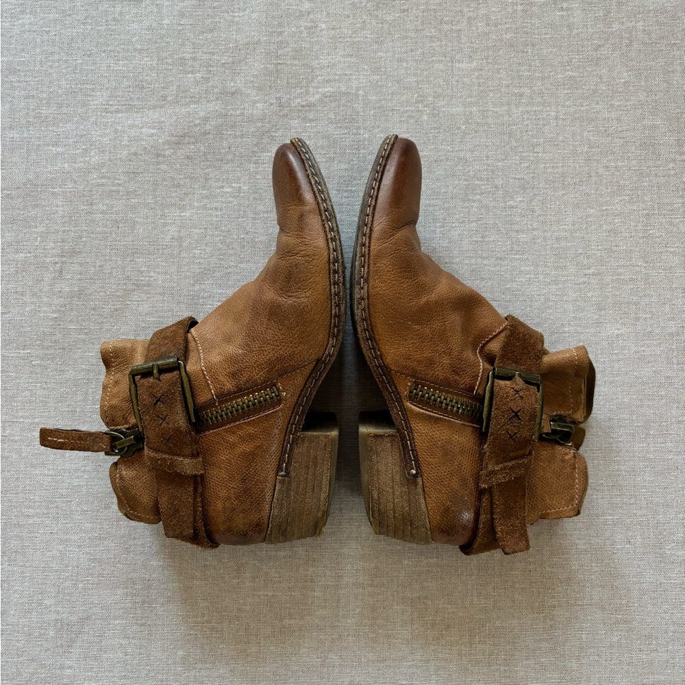 Dolce Vita brown rugged cowboy leather strap booties.